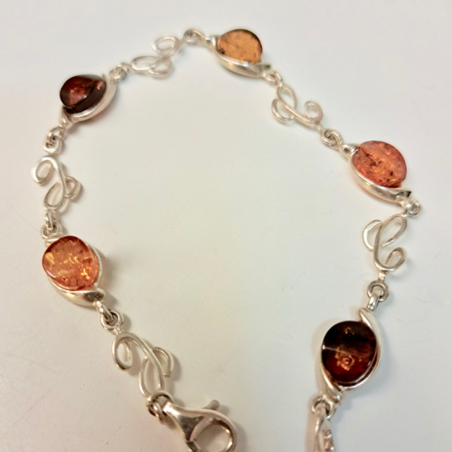 Click to view detail for HWG-2332 Bracelet Light and Dark Amber with Sterling Silver Designs $65